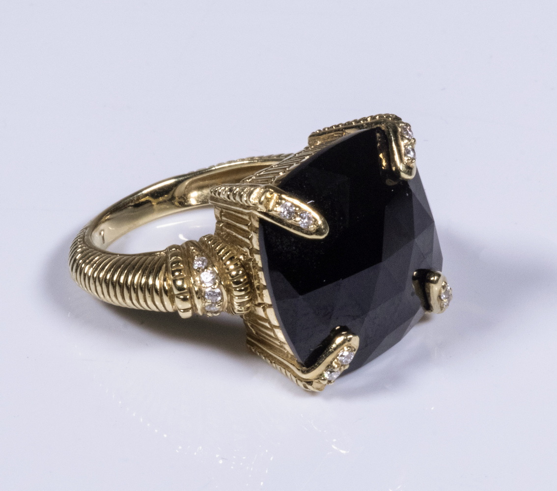 Appraisal: CUSTOM K GOLD DESIGNER RING With a faceted cushion cut