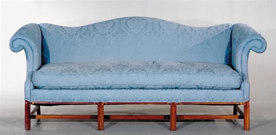 Appraisal: Chippendale style carved mahogany camelback sofa th century serpentine back