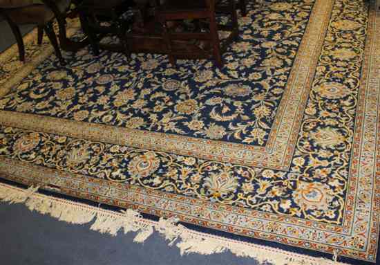 Appraisal: A Kashan carpet with field of scrolling foliage on a