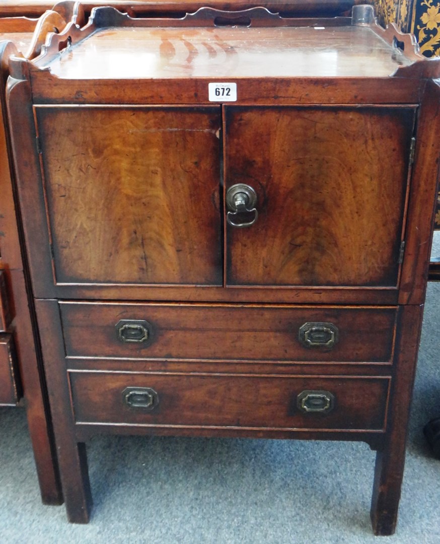 Appraisal: A George III mahogany tray top night commode with pair