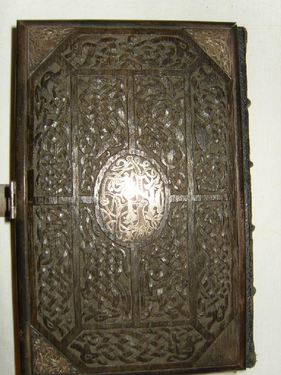 Appraisal: A th century prayer book with carved oak binding and