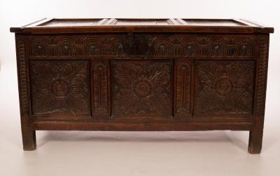 Appraisal: A Charles II oak coffer probably Somerset the triple-panelled and