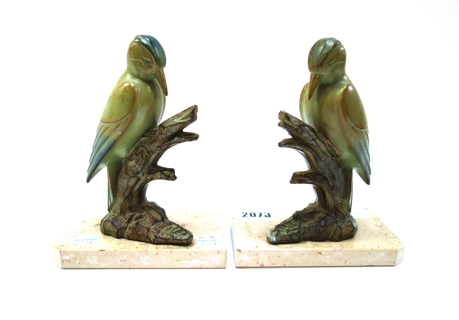 Appraisal: A pair of polychrome painted spelter woodpecker bookends of Art