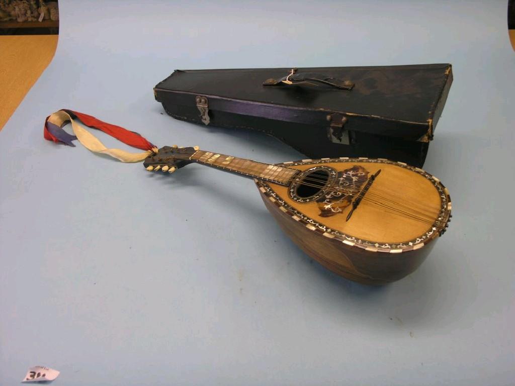 Appraisal: An Italian mandolin Stridente rosewood with mother of pearl and