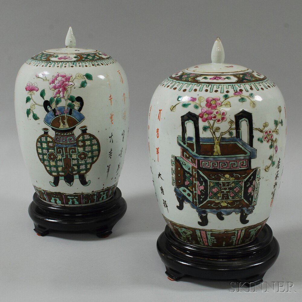 Appraisal: Pair of Chinese Polychrome Enameled Covered Jars depicting flowering plants