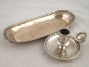 Appraisal: A silver snuffer tray with reeded border hallmarked London approx