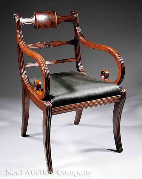 Appraisal: An American Classical Carved Mahogany Armchair c Boston crested with