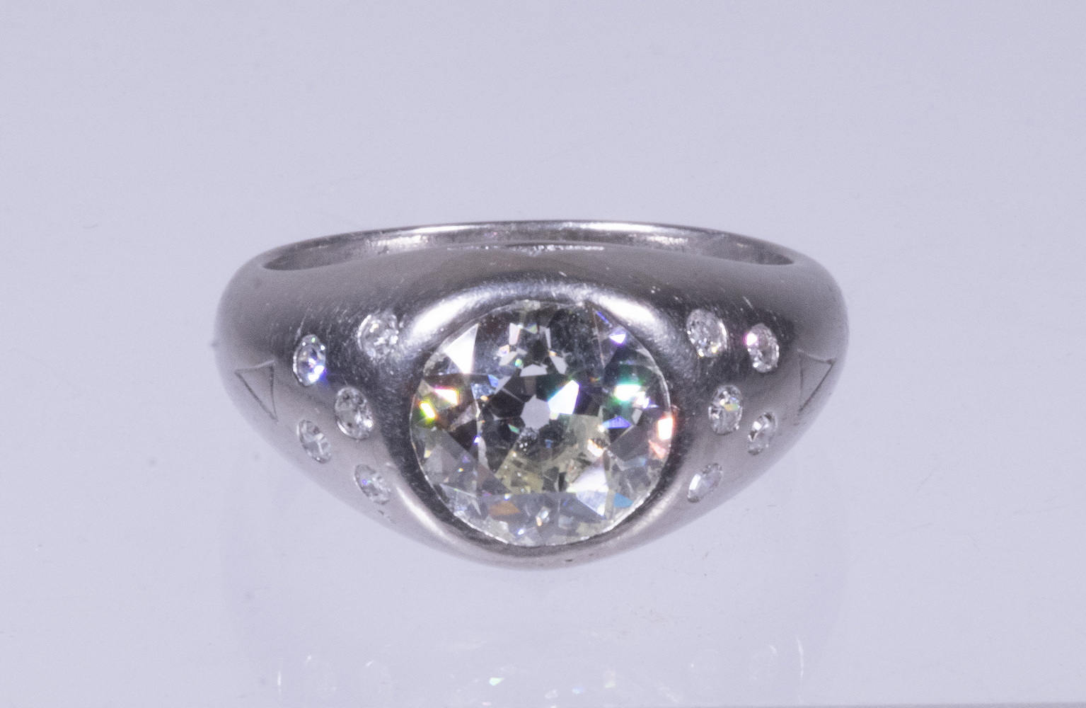 Appraisal: GENT'S PLATINUM AND DIAMOND RING Hand constructed ring featuring a