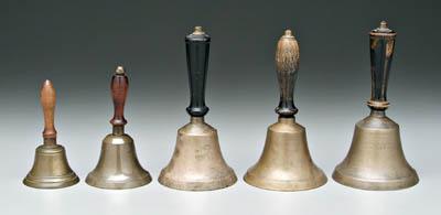 Appraisal: Assembled set of five brass bells turned wooden handles in