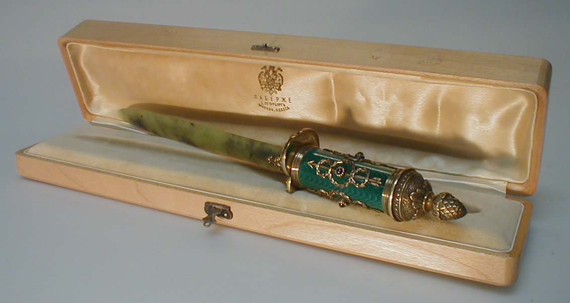 Appraisal: Faberg - A paper knife with jade green guilloch enamelled