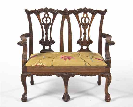 Appraisal: A Chippendale Style Double Back Child's Settee having a carved