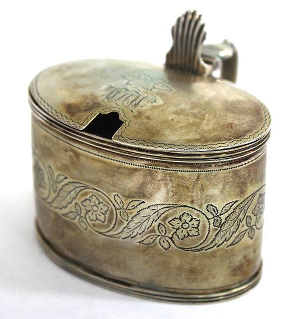 Appraisal: A GEORGE III SILVER OVAL MUSTARD POT with engraved floral