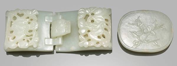 Appraisal: Two white jade belt buckles The first with two sections