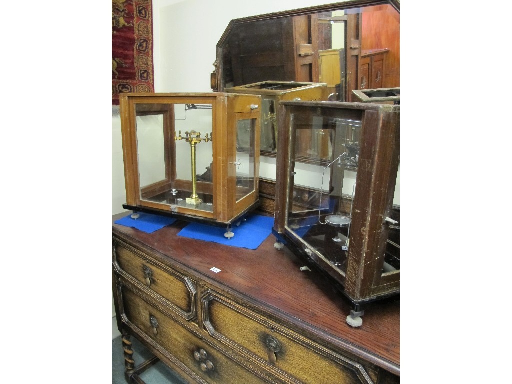 Appraisal: Two sets of Baird and Tatlock scientific scales in glazed