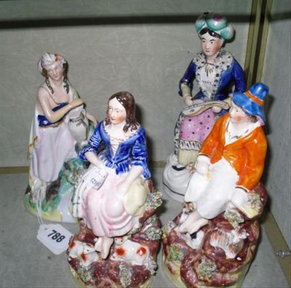 Appraisal: A collection of Staffordshire figures including a lute player