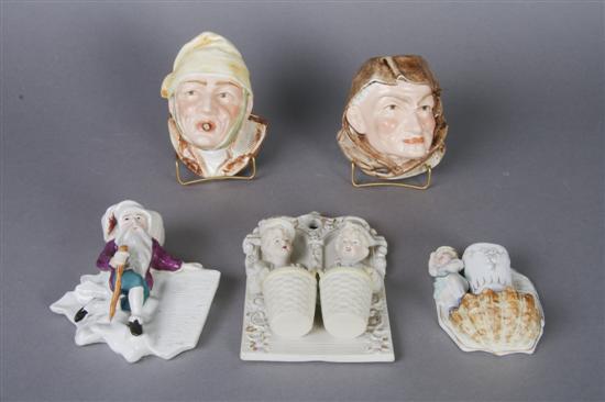 Appraisal: A Collection of Five Figural Wall Mount Match Strikes Height