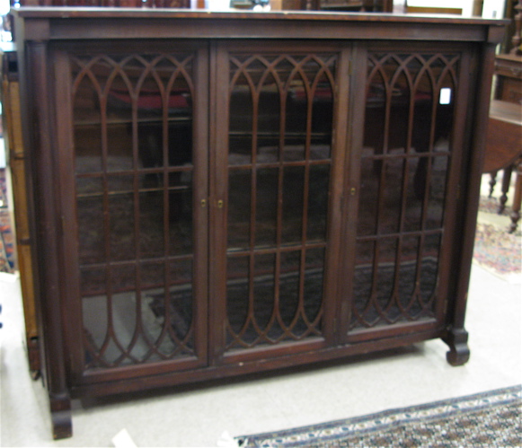 Appraisal: FEDERAL EMPIRE REVIVAL MAHOGANY BOOKCASE American c the interior divided