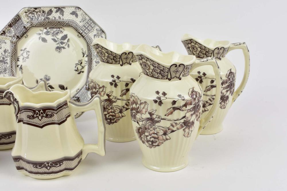 Appraisal: TWENTY-ONE ENGLISH BROWN TRANSFERWARE SERVING ITEMS th thCentury Most decorated