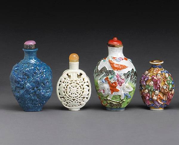 Appraisal: Four molded porcelain snuff bottles The first a blue-colored bottle