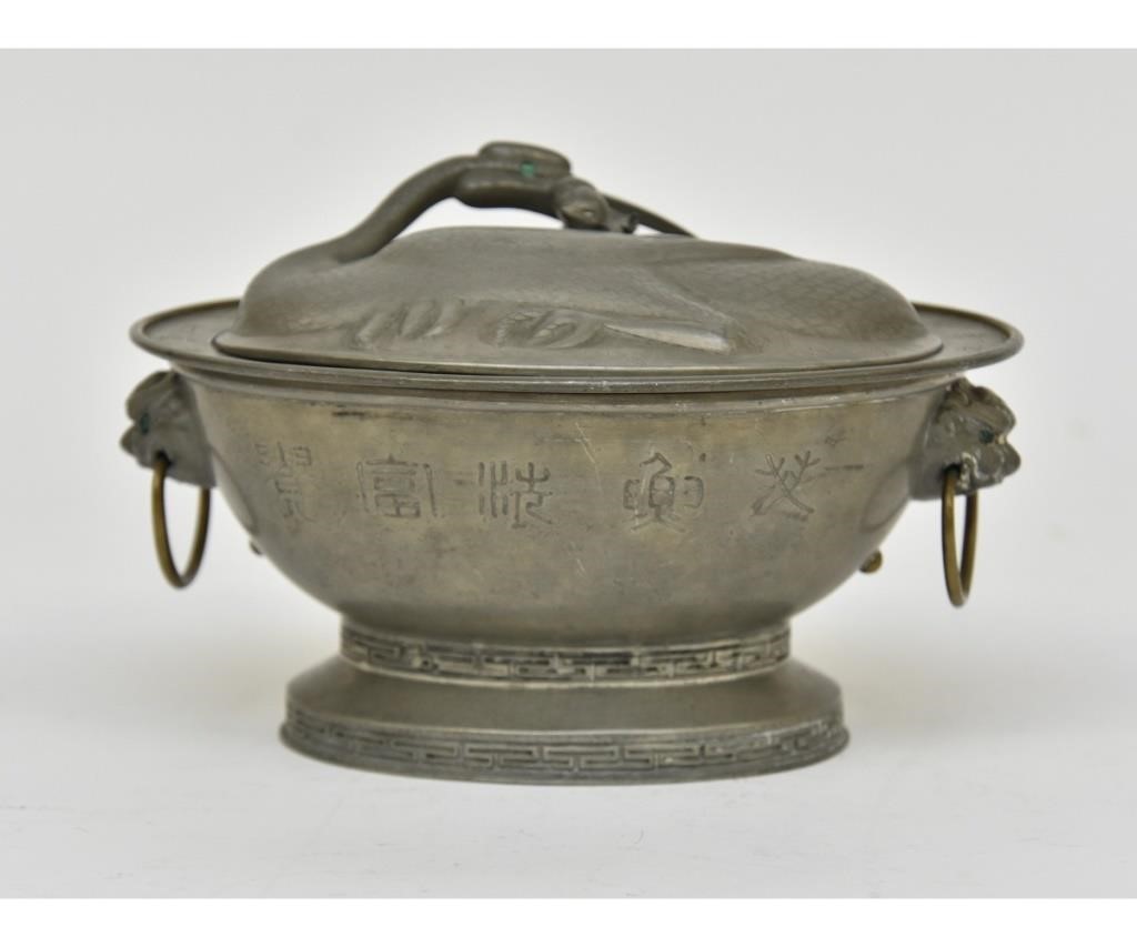 Appraisal: Chinese pewter oval warming dish with crane bird lid probably