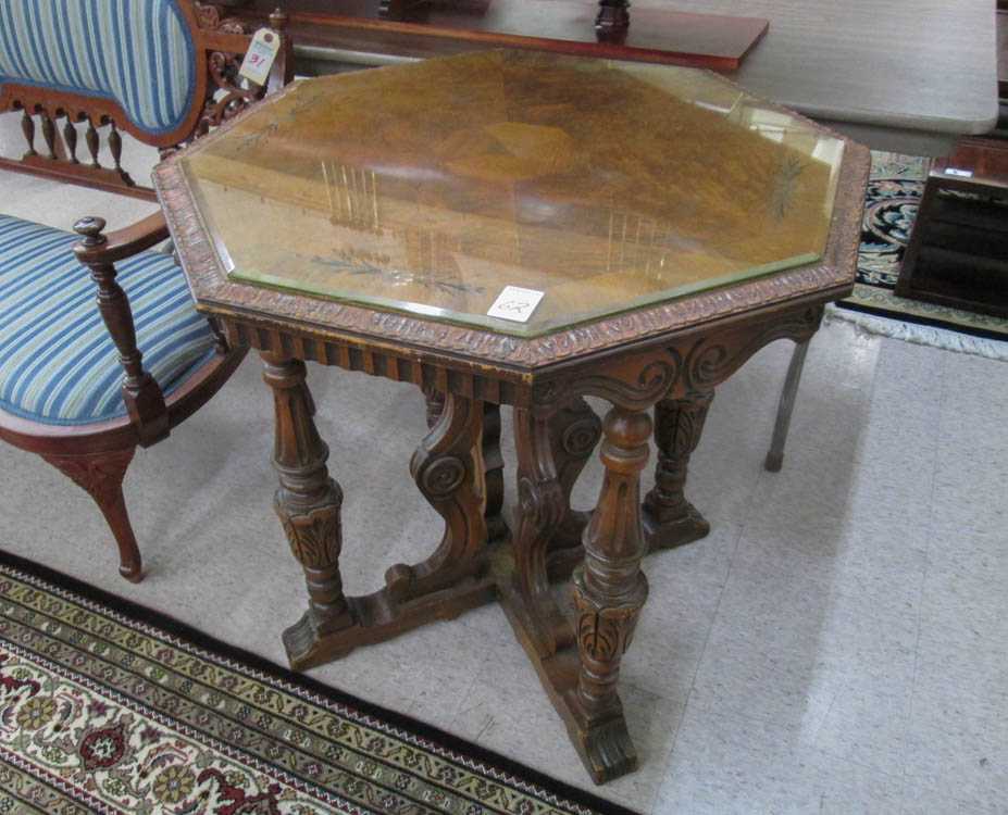 Appraisal: AN OCTAGONAL WALNUT CENTER TABLE Angelus Furniture Mfg Co Los