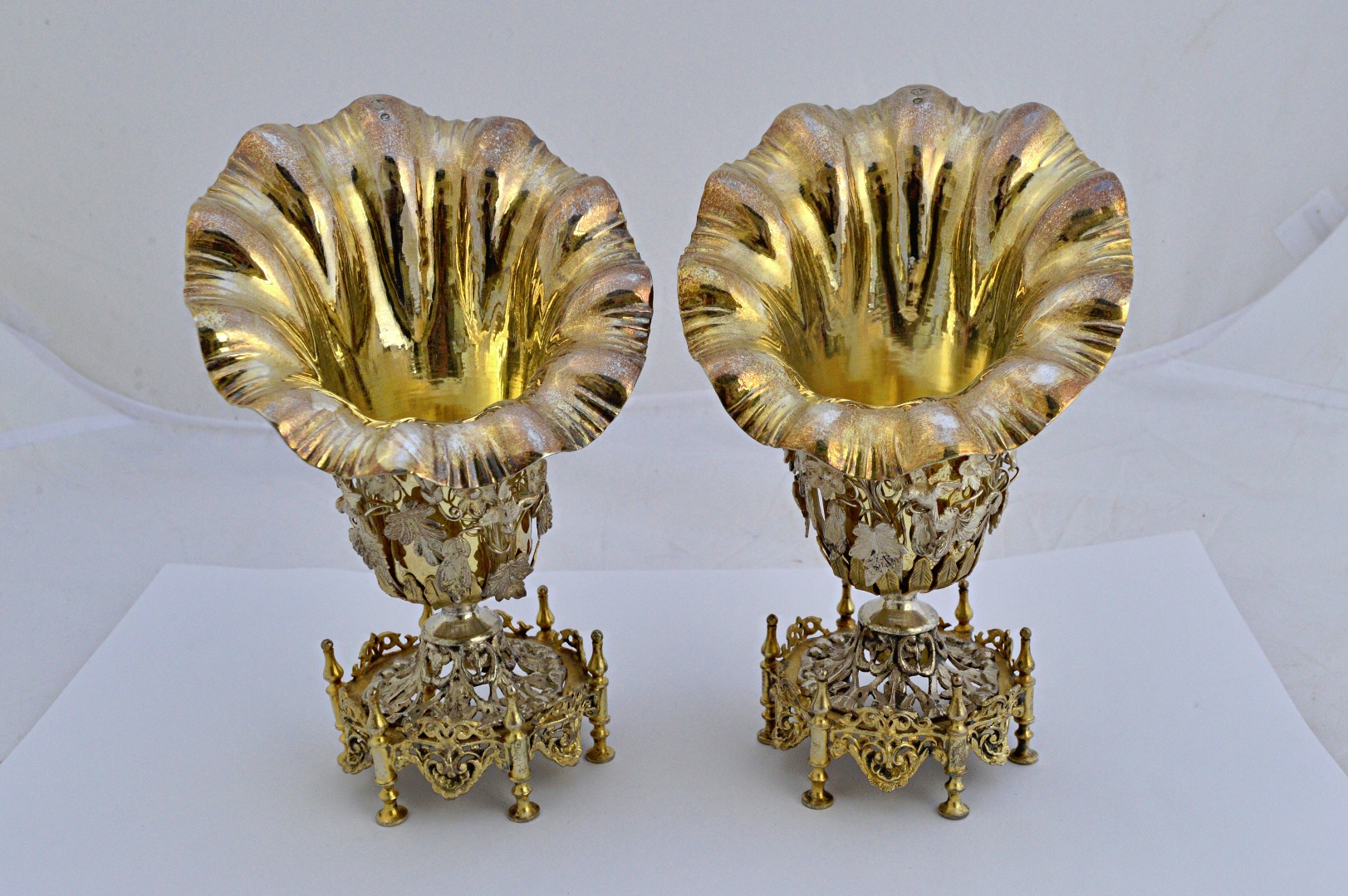 Appraisal: A pair of Turkish parcel gilt vases each of flared