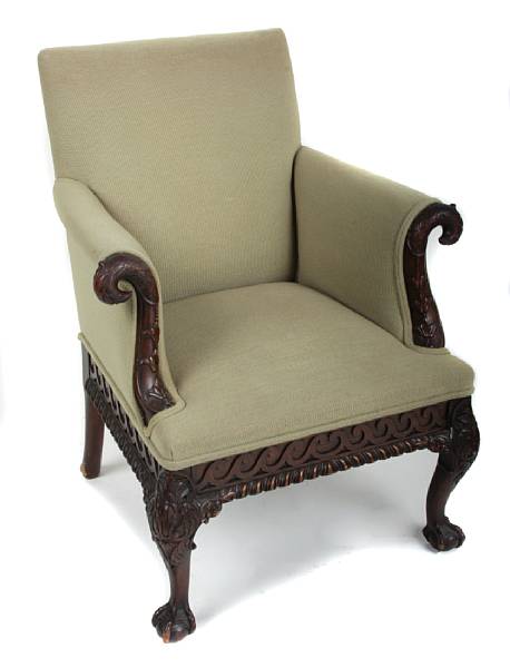 Appraisal: A pair of George I style carved mahogany and upholstered