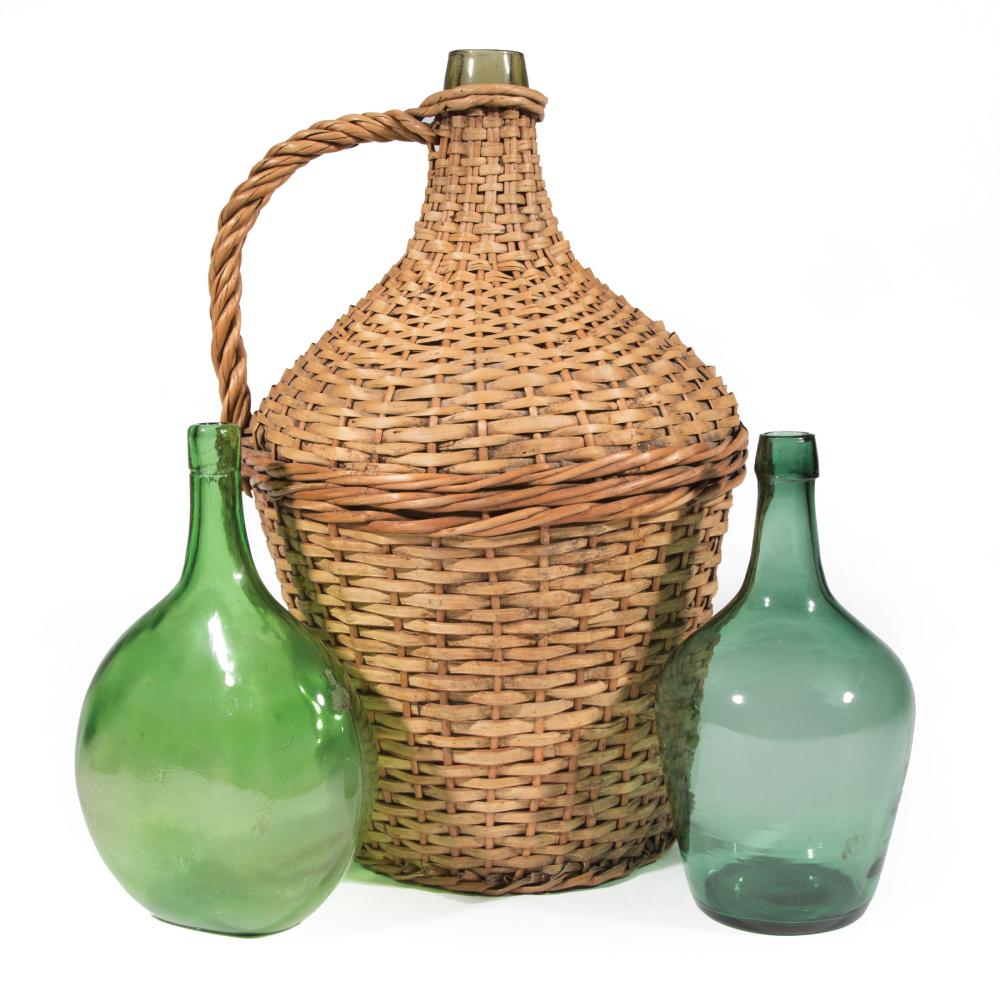 Appraisal: Three Green Blown Glass Demijohns th th c incl wicker