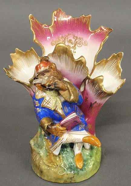 Appraisal: Colorful French porcelain spill vase th c with a seated