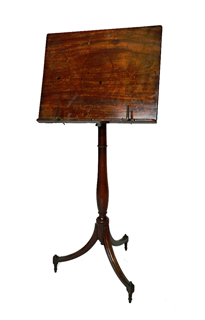 Appraisal: A George III mahogany music stand the angle adjustment top