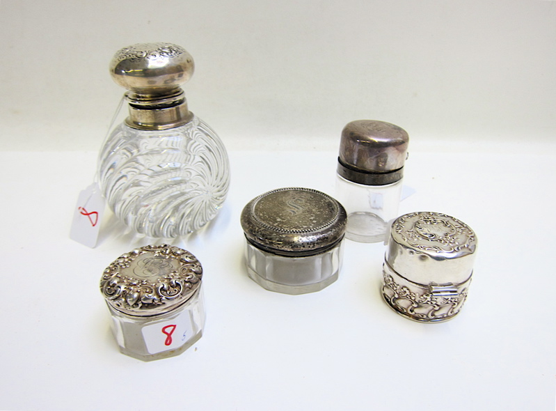 Appraisal: FIVE STERLING SILVER LIDDED DRESSER ACCESSORIES Tiffany Makers crystal scent