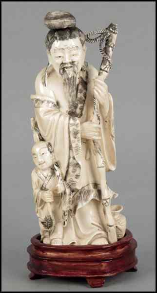 Appraisal: CHINESE CARVED IVORY FIGURE OF A OLD MAN AND A