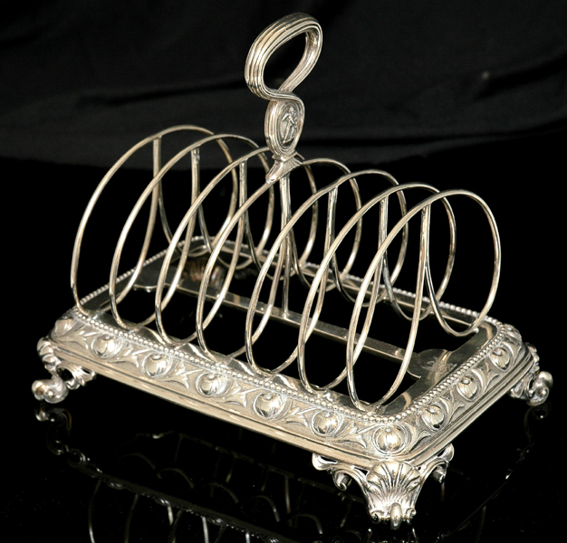 Appraisal: A VICTORIAN STERLING SILVER TOAST RACK Maker's mark Robert Garrard