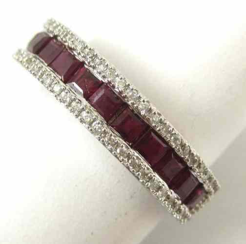 Appraisal: RUBY DIAMOND AND FOURTEEN KARAT GOLD RING set with a