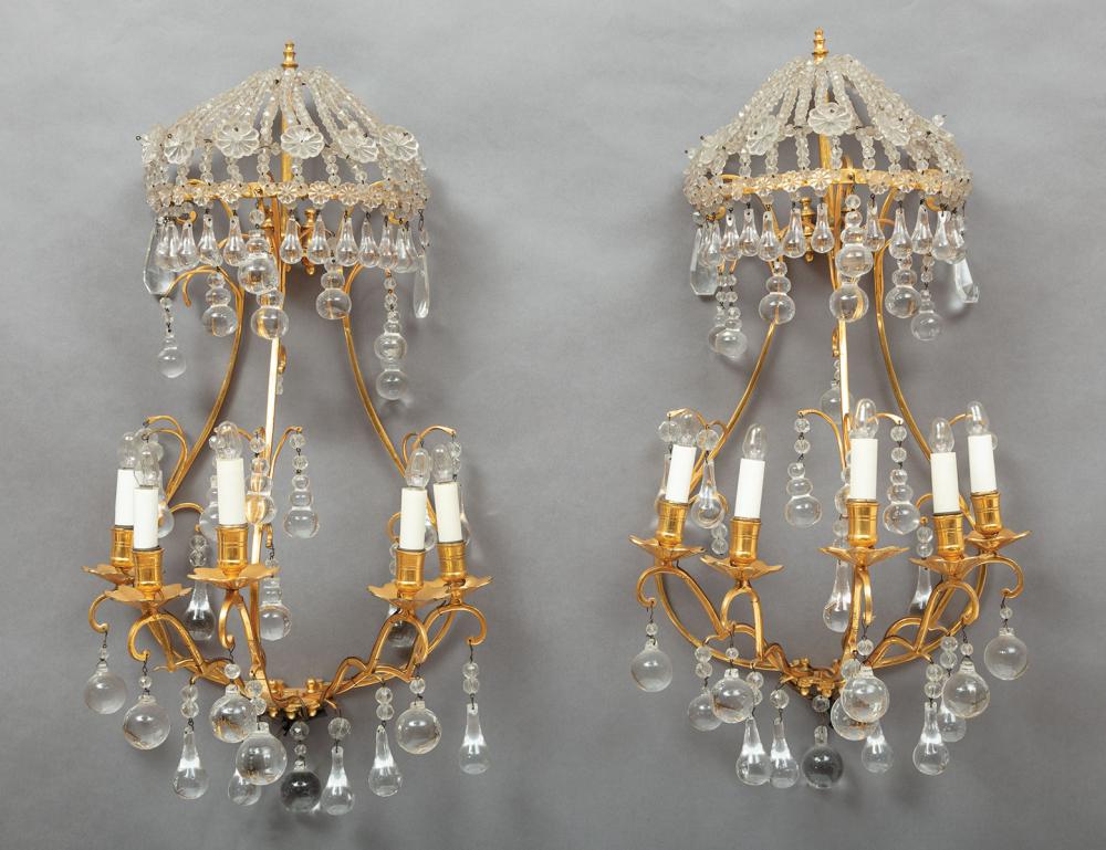 Appraisal: Pair of Continental Gilt Metal and Crystal Four-Light Sconces th