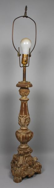 Appraisal: Antique Continental carved wooden candlestick electrified with figureheads on base