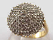 Appraisal: A carat gold diamond cluster ring estimated diamond content approx