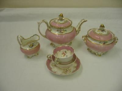 Appraisal: A STAFFORDSHIRE PORCELAIN PART TEA SET painted with floral sprays