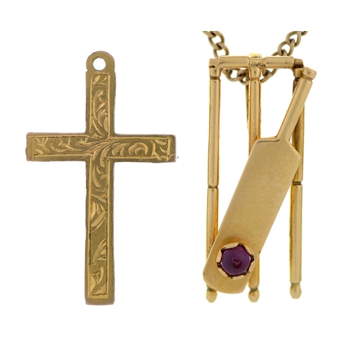 Appraisal: A ruby cricket bat and stumps pendant in gold marked