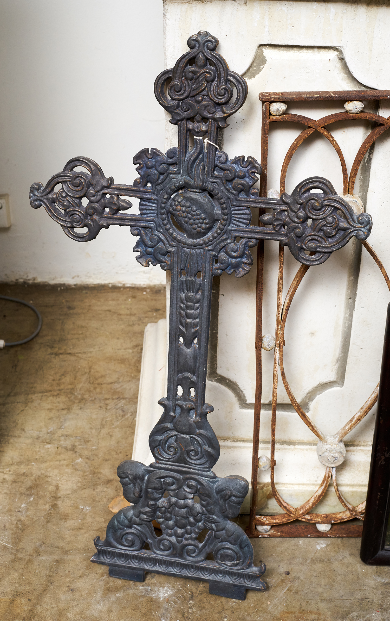 Appraisal: A th CENTURY FRENCH CAST IRON CRUCIFIX Decorative motif h