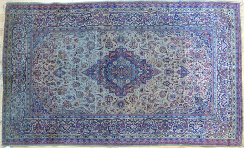 Appraisal: Silk Persian rug ca with a central medallion on an