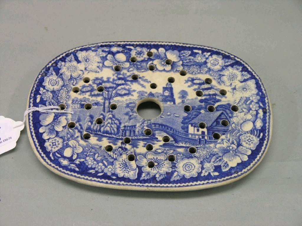 Appraisal: An early th century blue printed drainer in together with