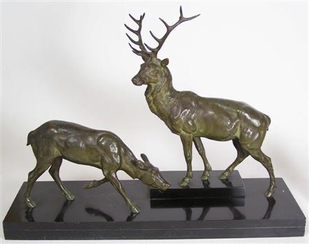 Appraisal: A bronze group of a stag and a hind early