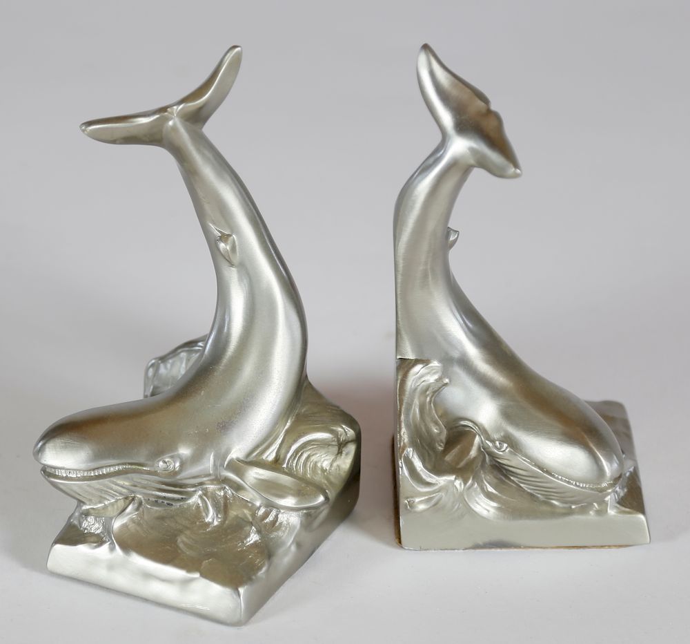 Appraisal: Pair of P M Craftsman Whale on a Wave Bookends