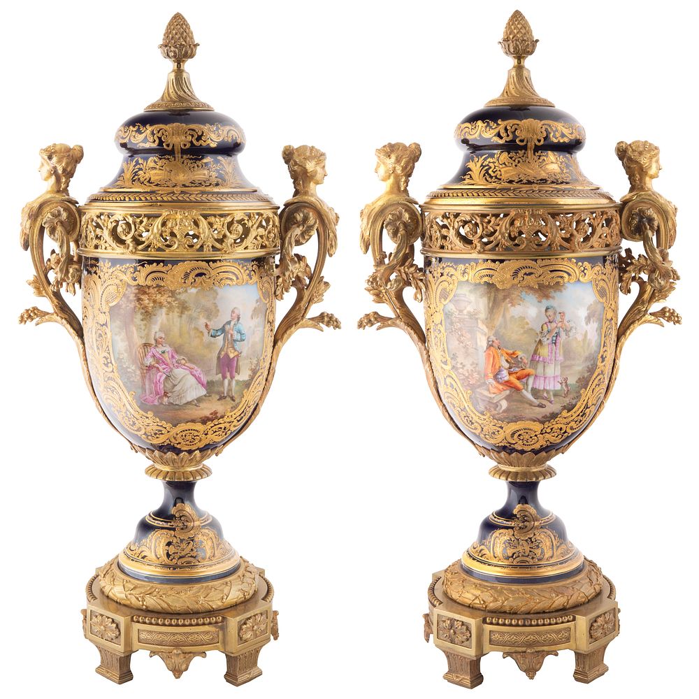 Appraisal: A PAIR OF POTPOURRI SEVRES STYLE PORCELAIN VASES T REBEL