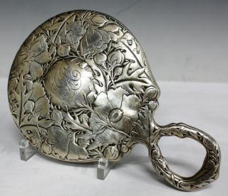 Appraisal: Gorham Chased Repouss Sterling Hand Mirror Adorned with poppies lotus