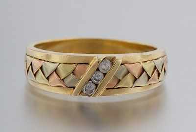 Appraisal: A Gentleman's Tri Color Gold and Diamond Band k yellow