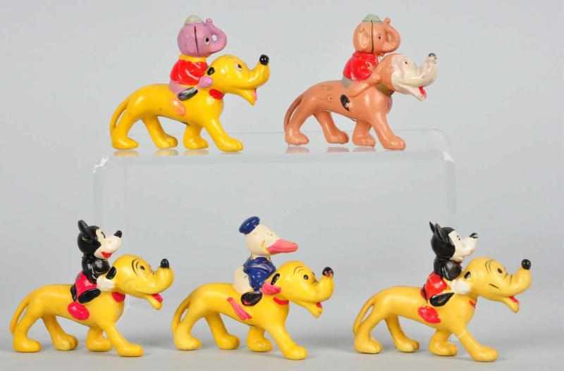 Appraisal: Lot of Disney Characters Riding Pluto Description Pre-war Celluloid Very