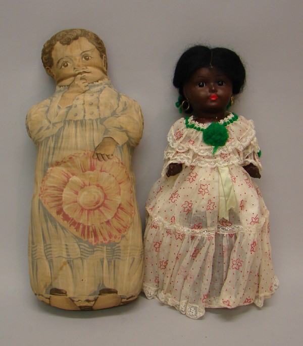 Appraisal: Pair of black dolls Cloth printed doll made in England