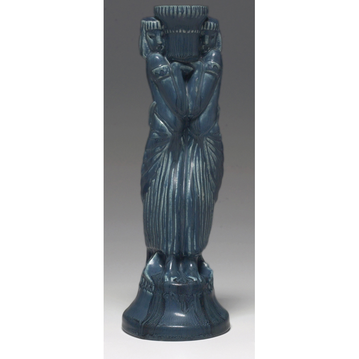 Appraisal: Rookwood candlestick Egyptian motif covered in a blue matt glaze